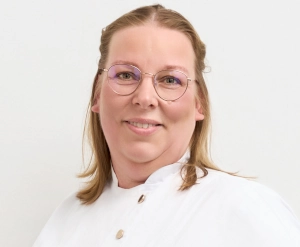 Ina M.